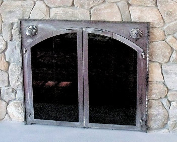 Allison with shells and molding on surround all natural iron finish with vice bi fold doors standard smoke glass comes with sliding mesh spark screen